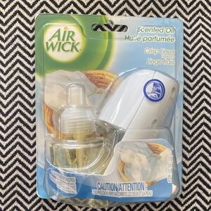FREE Air Wick Scented Oil Warmer with Refill